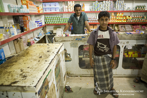 Grocery store and owners, Hawf Protected Area, Yemen
