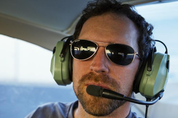 Mountain Lion (Puma concolor) biologist, Paul Houghtaling, tracking mountain lions from airplane using telemtry, Santa Cruz Puma Project, Livermore, California